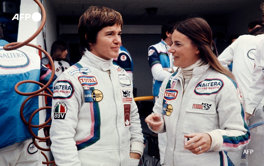 Driver's Lella Lombardi and Christine Beckers talk during Grand Prix of Endurance in Le Mans, 1977