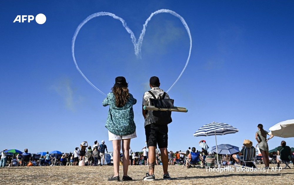 Spectators watching the Emirati elite aerobatic flying team Fursan Al Emarati of the United Arab Emirates Air Force